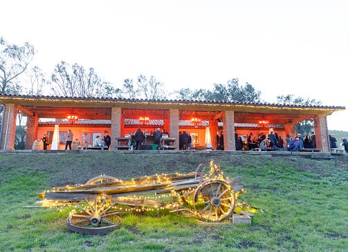 Venue exterior glowing at twilight
